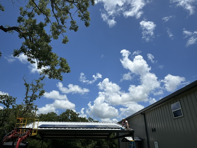 blue sky and solar panels
